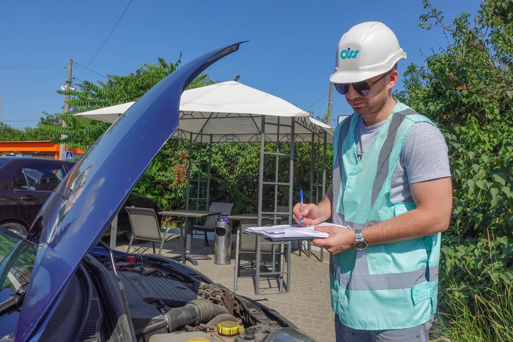 фото Інспекція автомобілів або нерухомості